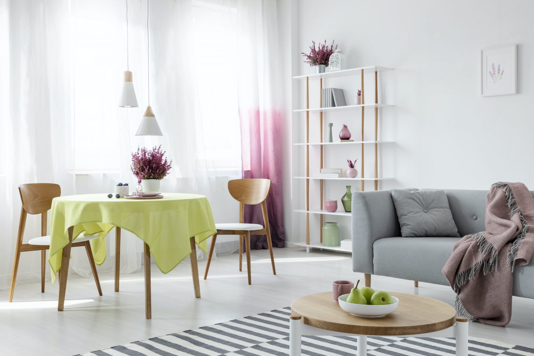living-and-dining-room-in-modern-apartment-with-grey-couch-and-w.jpg
